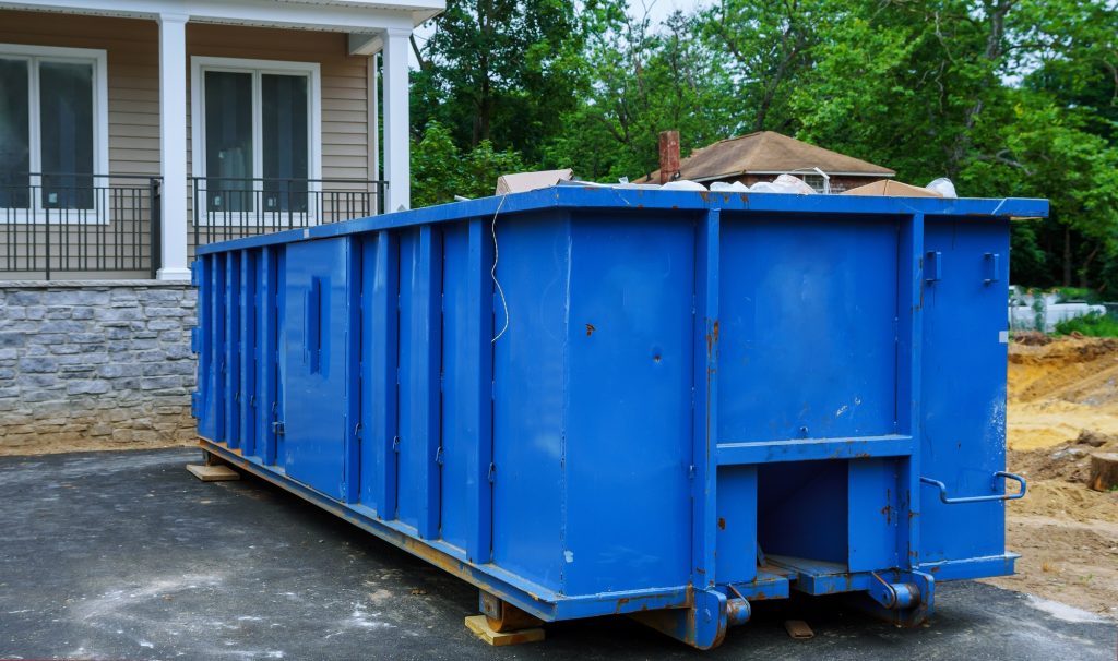 Full construction rubbish bin with loads at construction site waste debris container